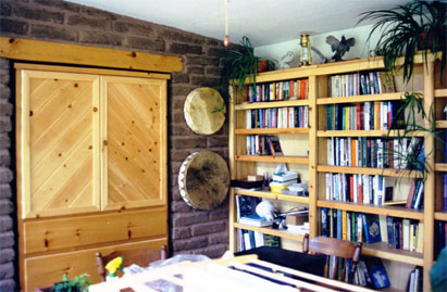 book case on adobe wall