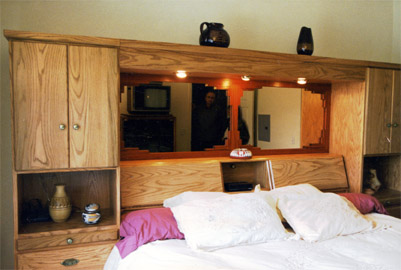 oak wall unit with paduak mirror frame