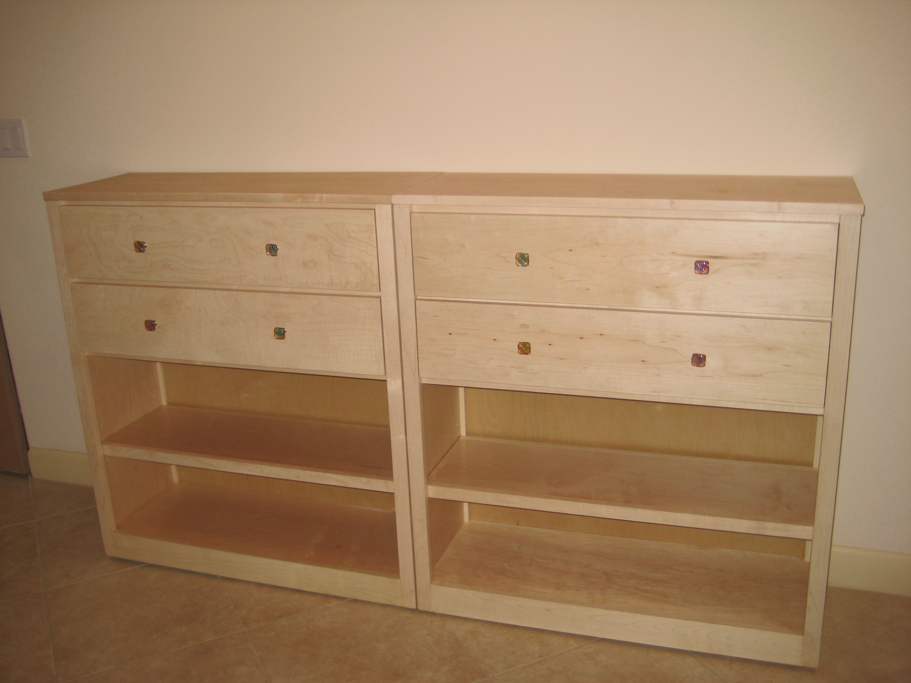 white maple bookshelf with CD drawers