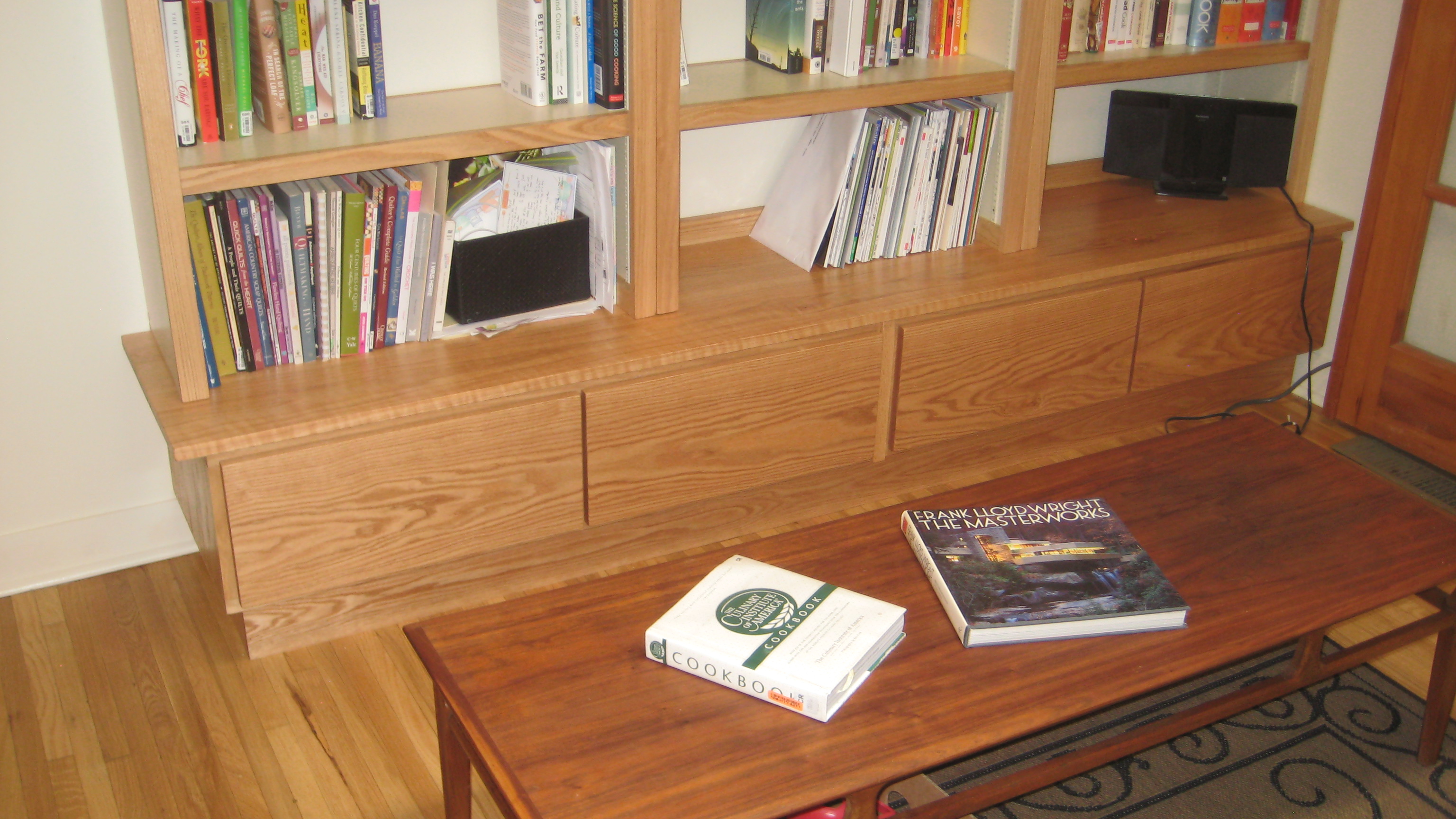 Oak bookshelf with lower drawers