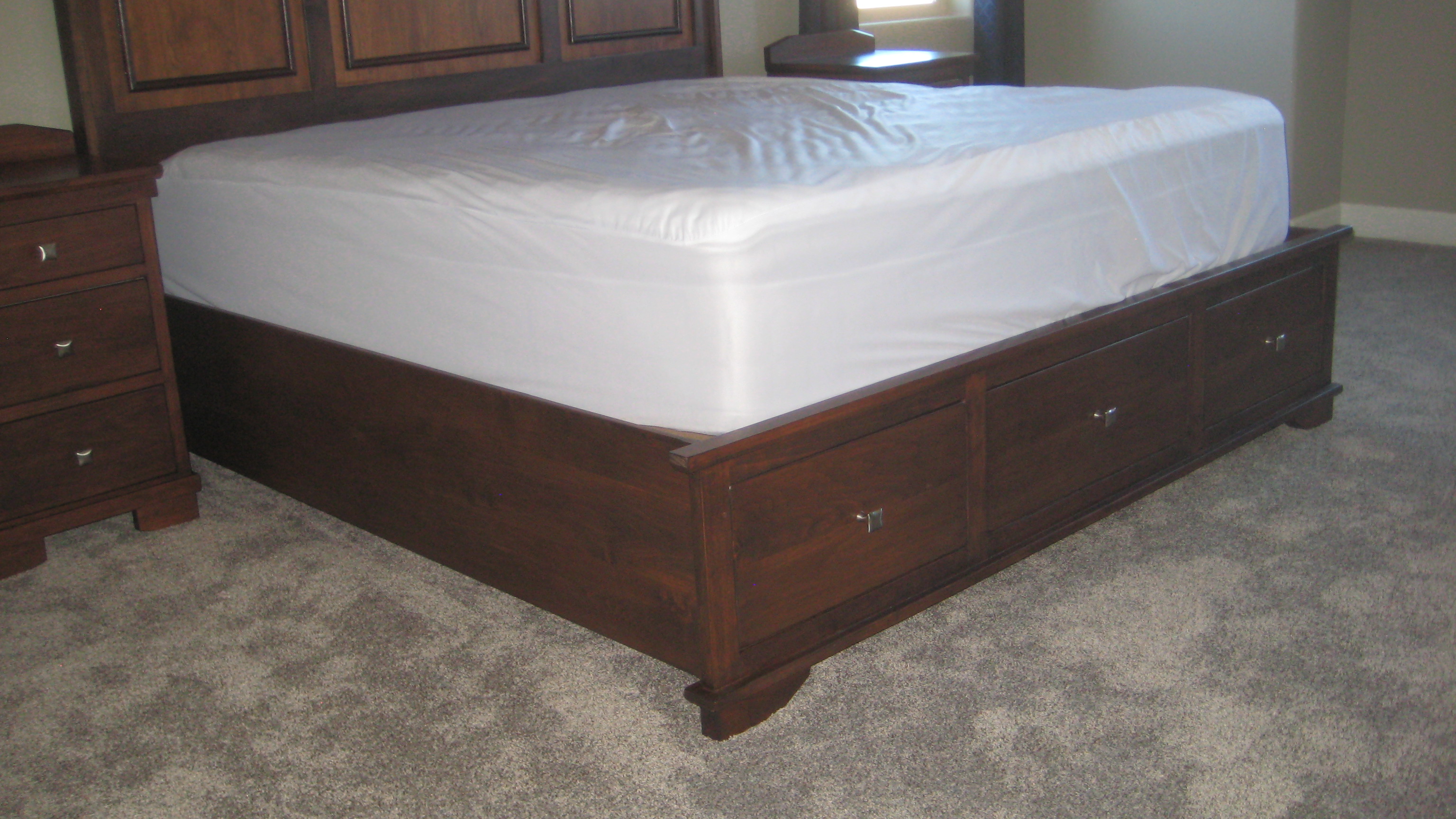 pedestal bed in Alder with drawers