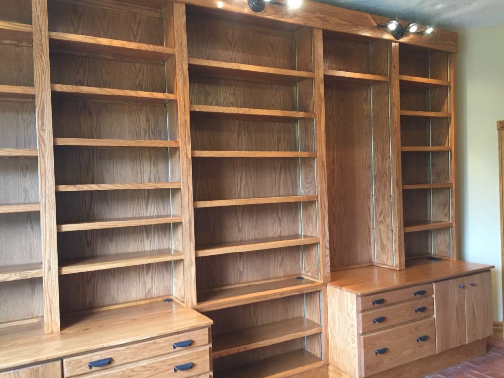 Oak bookshelf with lower drawers